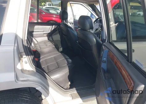 1997 Jeep Grand Cherokee Limited z USA, uszkodzony, nr VIN 1J4GZ78Y9VC699071